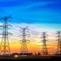 high voltage post,High voltage tower sky sunset background